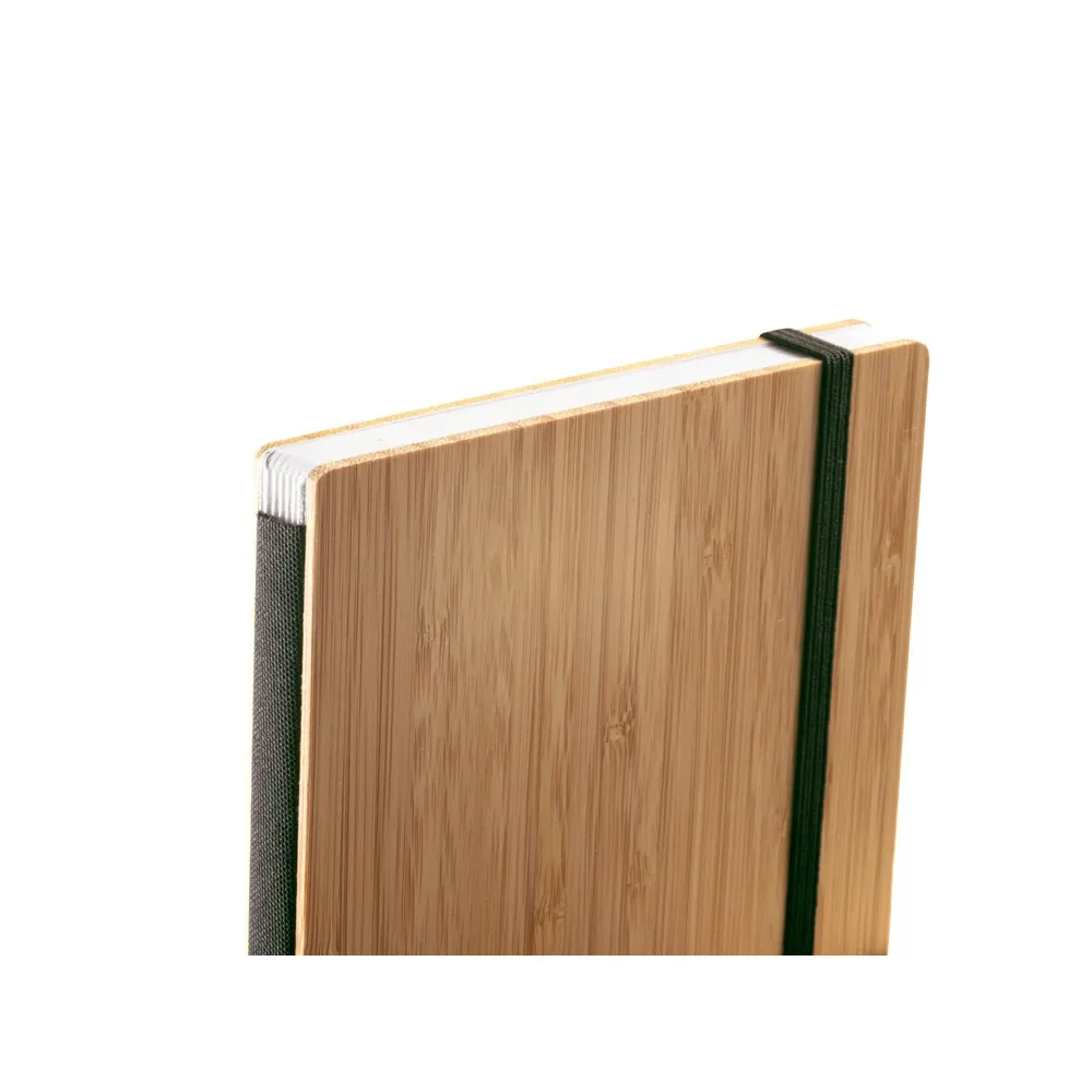 BUARQUE POCKET. Caderno de bolso com capa e contracapa em placa de bambu e lombada em PET 100% reciclado, com 160 páginas lisas