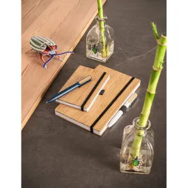 Miniatura de imagem do produto BUARQUE A5. Caderno A5 de capa e contracapa em placa de bambu e lombada em poliéster 100% reciclado (100% rPET)